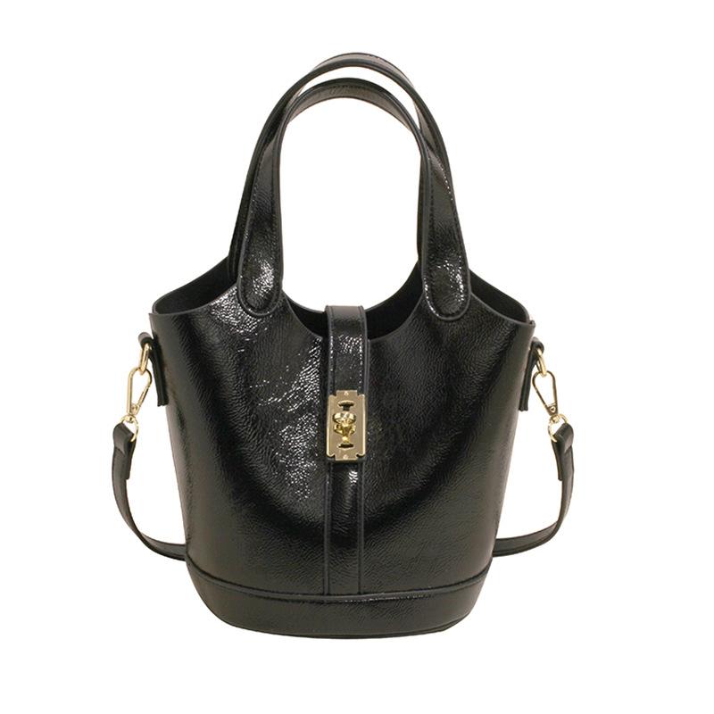 This Year's Popular Fashion Korean Version of Simple Solid Color Portable Bucket Bag Women's Casual Versatile Commuter Messenger Child and Mother Bag