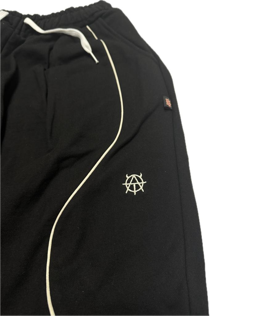 Aseuteleuwoldeu Symbol Logo Two-Tuck Cotton Track Pants (Black)