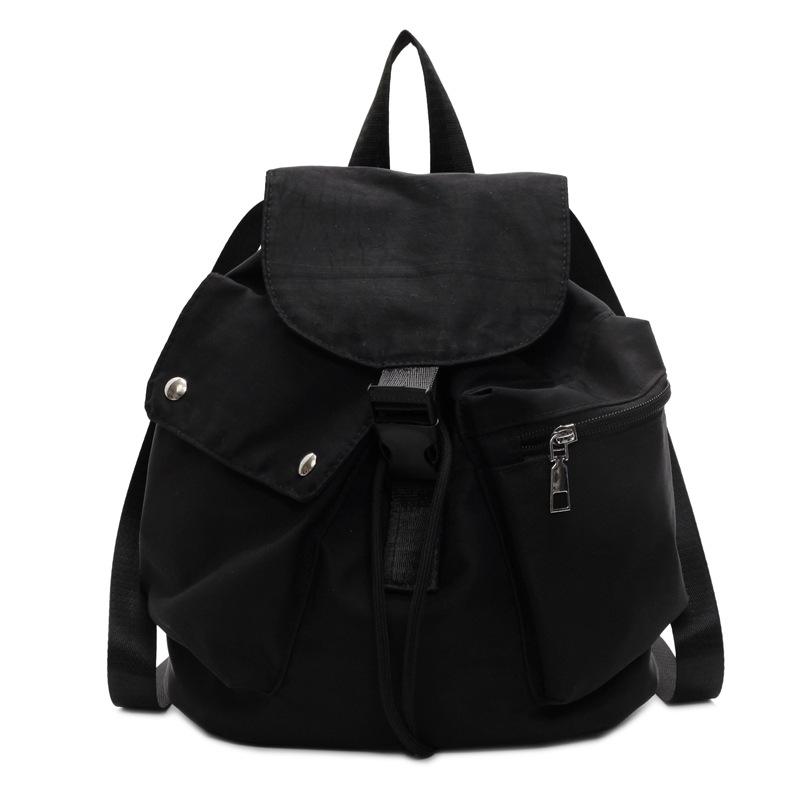 Large-capacity student party early spring new leisure niche design handbag commuting versatile canvas backpack