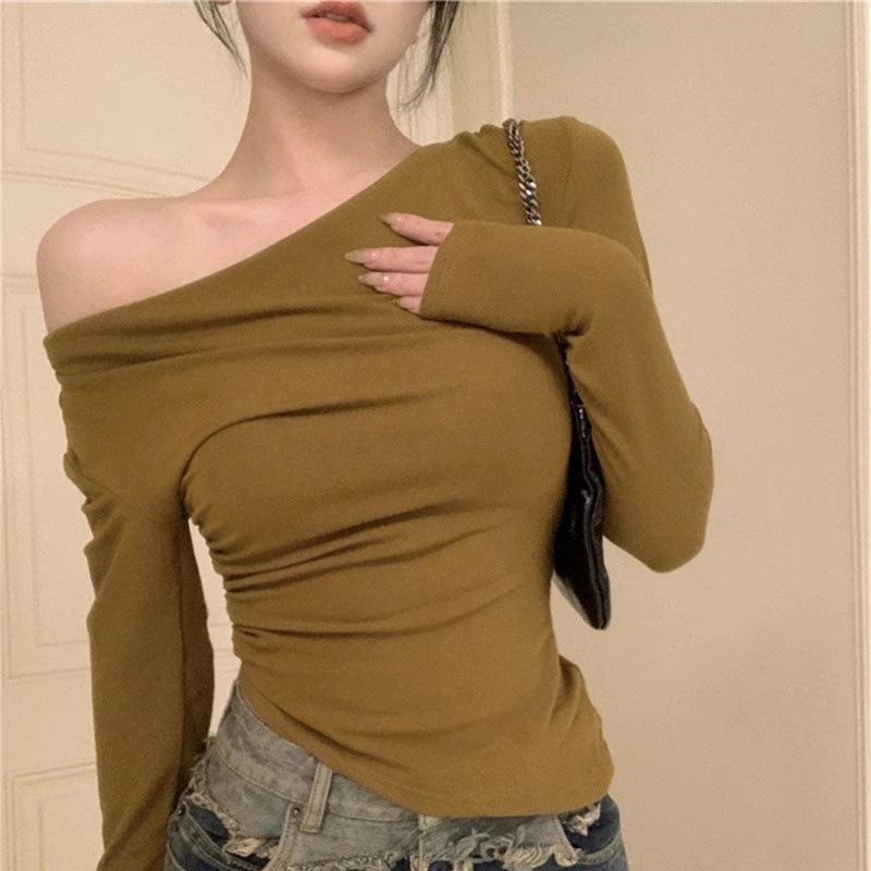 Frühling und Herbst Hot Girls Einseitiges Langarm-T-Shirt Damen Frühling Slim Schlüsselbein Unregelmäßiges Design Nische Kurzes Oberteil
