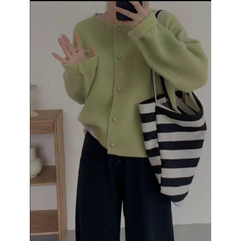 Autumn and winter new round neck solid color knitted cardigan loose lazy soft waxy sweater women's coat tide