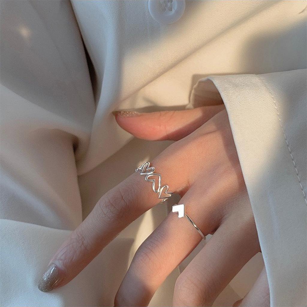 2 Stück Modische Ringe mit Herz-Ausschnitt Öffnungsringe Bequem zu tragen Fingerringe Party-Accessoire Ringe Metalltextur