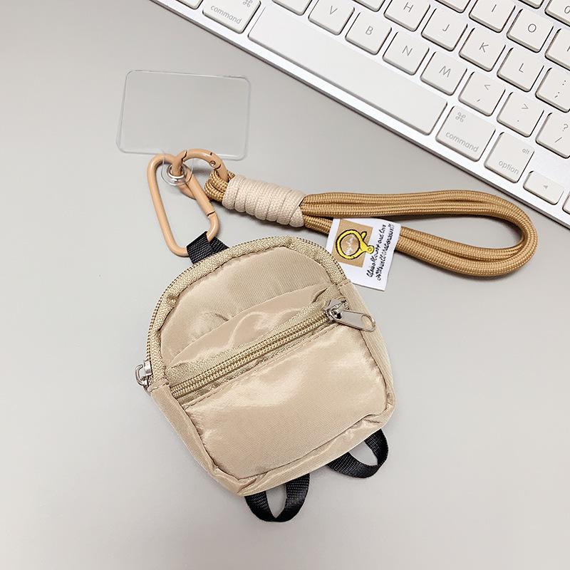 Double-layered small schoolbags, coin purses, phone cases, backpacks, pendants, and earphone covers are all universal