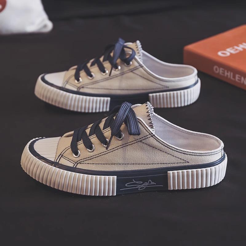 Super fire bag head half slippers women's outer wear 2025 summer new lazy thick-soled white canvas cool slippers sandals