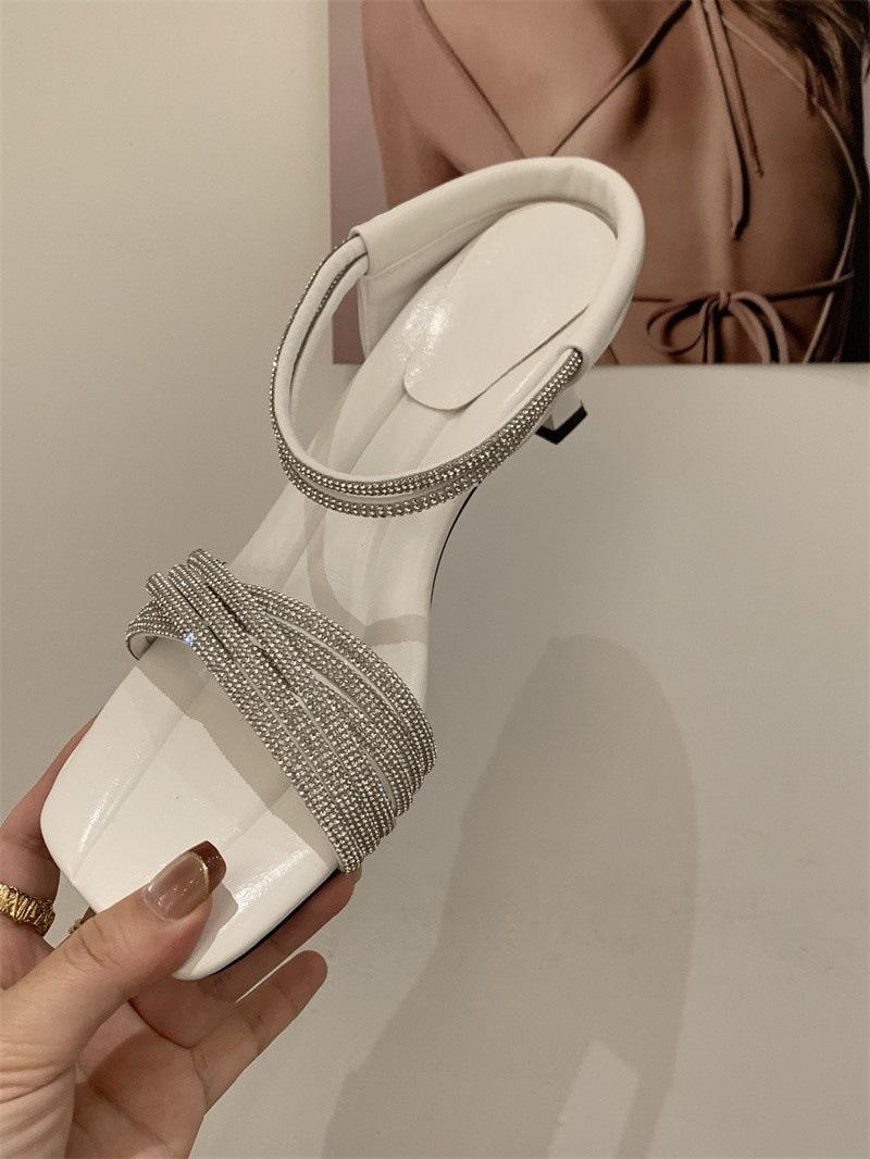 

Women wearing high-end cool slippers 2025 popular word with rhinestones thick heel temperament beautiful half slippers women 40