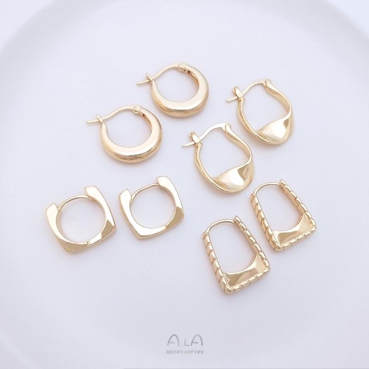 Elegante Ohrringe mit 14 Karat Goldfüllung: Quadratisch, Tropfenförmig, Rund, Gedreht, Handtaschen-Ohrklemmen - Leichter Luxus für Frauen