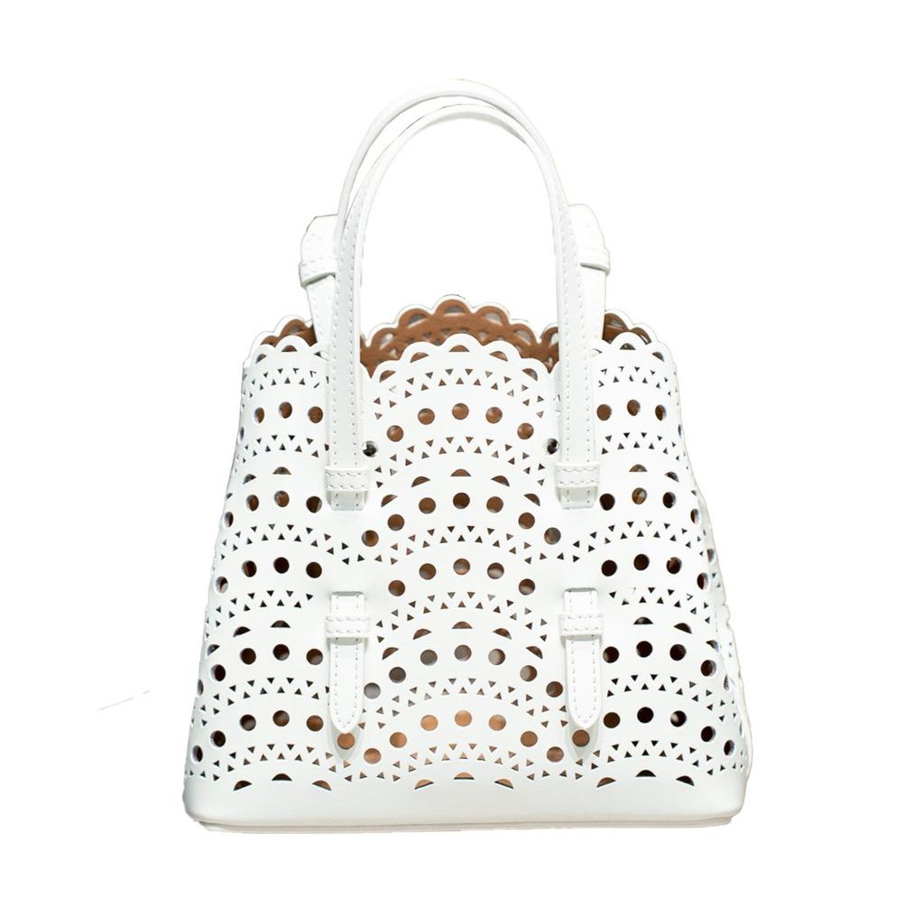 Velkoobchodní továrna prémiová niche vyřezávaná dutá taška na zeleninu Mina kožená dámská taška přes rameno crossbody tote taška