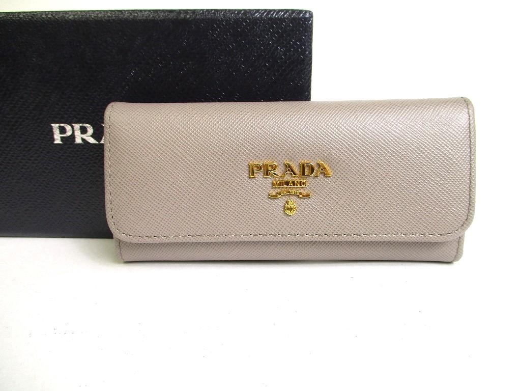 

Автентичний брелок зі шкіри PRADA Grey Saffiano 6 фото #a305 Refurbished