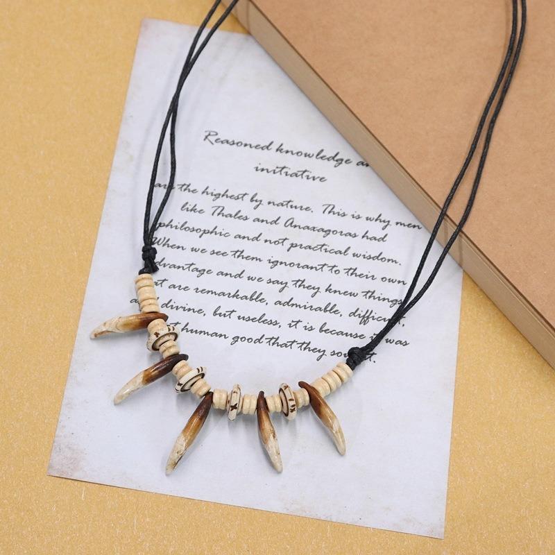 

Retro tribal wolf dog tooth yak bone necklace men and women simple personality long and short wild pendant accessories