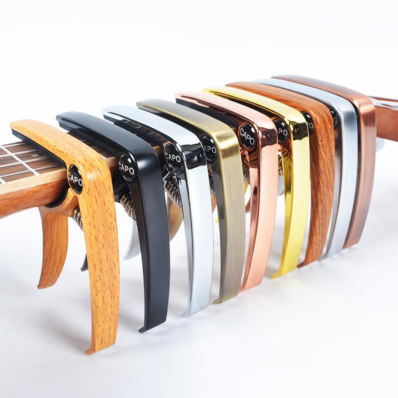 Zirconium Alloy Wood Grain Metal Capo: Multifunctional Transposition Clip for Guitar and Ukulele. Natural Wood