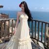 Seaside beach temperament dress suspender vacation dress beige sexy halter fairy summer mopping atmosphere