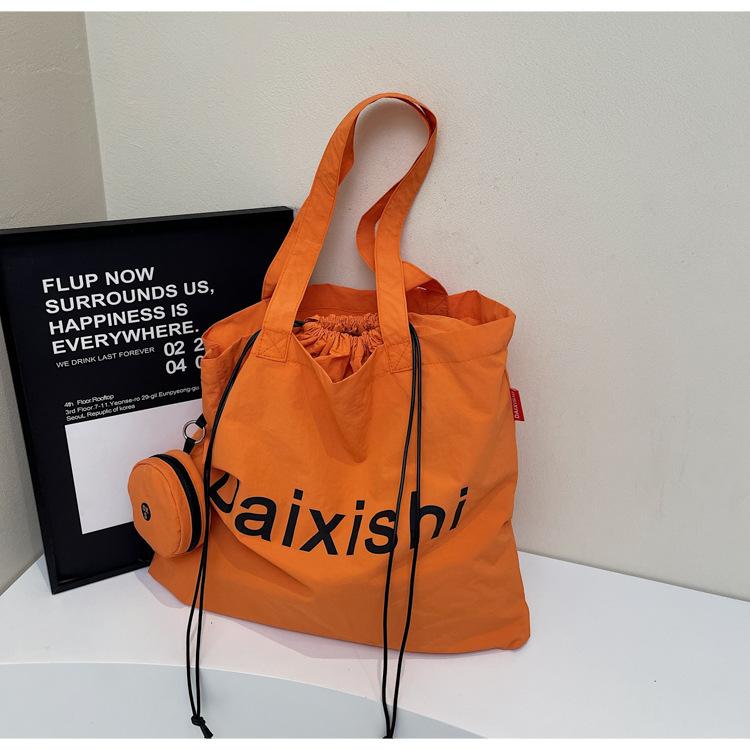 College students commute to class, large-capacity tote bag, women's 2025 new leisure child and mother canvas shoulder handbag