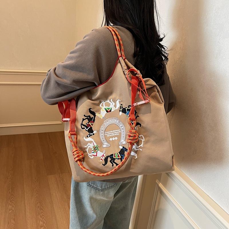 Literary small fresh embroidery pony contrasting color large capacity women's armpit bag new women's shoulder messenger bag