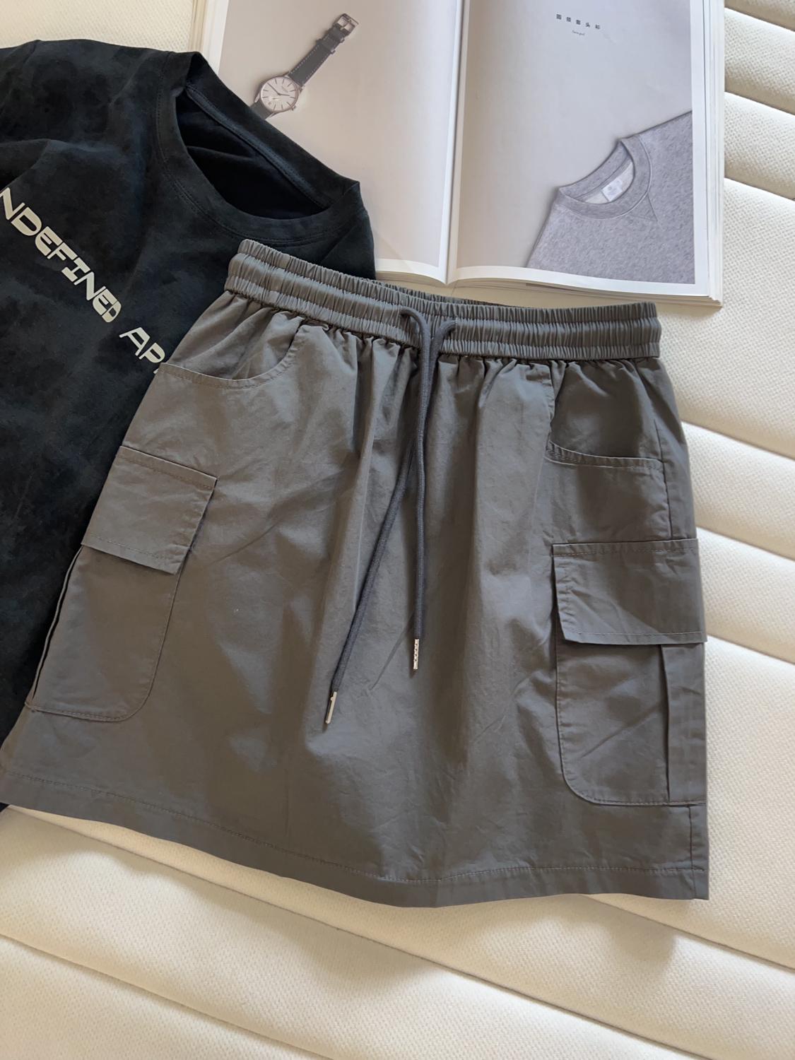 

Женская хлопковая миди-юбка А-силуэта с кулиской и карманами - Однотонная, эластичная талия, приталенный силуэт L темно-серого