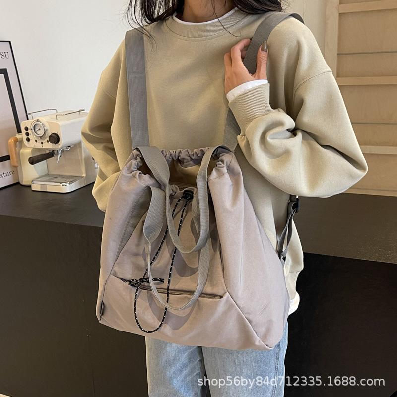 Fashion and leisure large-capacity tote bag women's 2025 spring portable versatile canvas bag multi-pocket shoulder bag