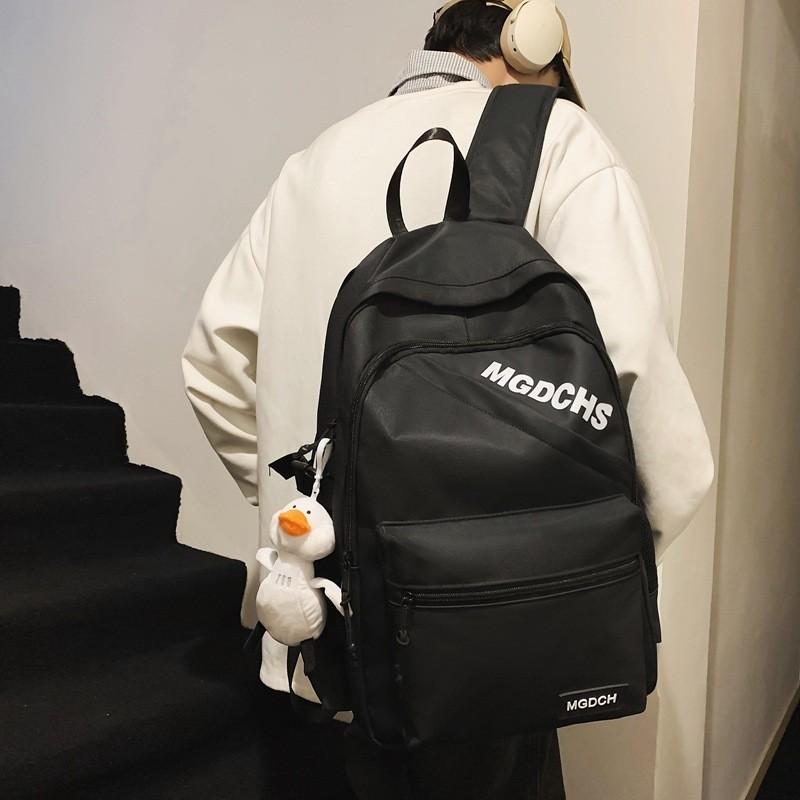 

Stylish Unisex Travel Backpack High Capacity Waterproof School Bag With Duck Pendant Red