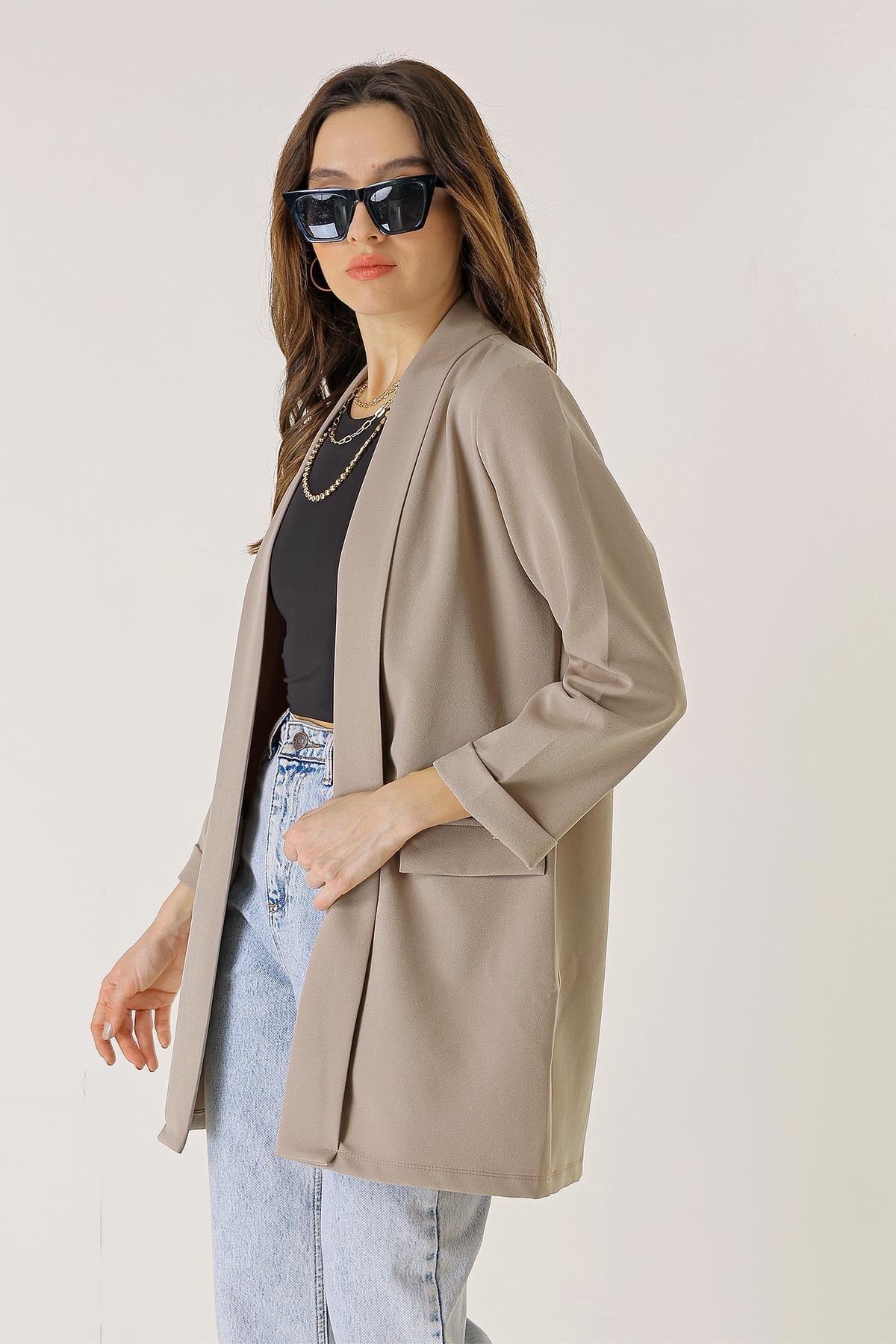 

Длинная куртка из лайкры с шалевым воротником и карманами L серебряный песка