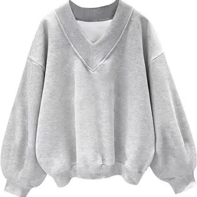 

Свитшот оверсайз с V-образным вырезом и рукавами-буфами из мягкой комфортной ткани, доступен в нескольких цветах S