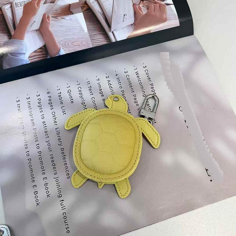 2025 New Leather Pendant Head Layer Leather Mini Earphone Bag Turtle Pendant Wallet Cross Border