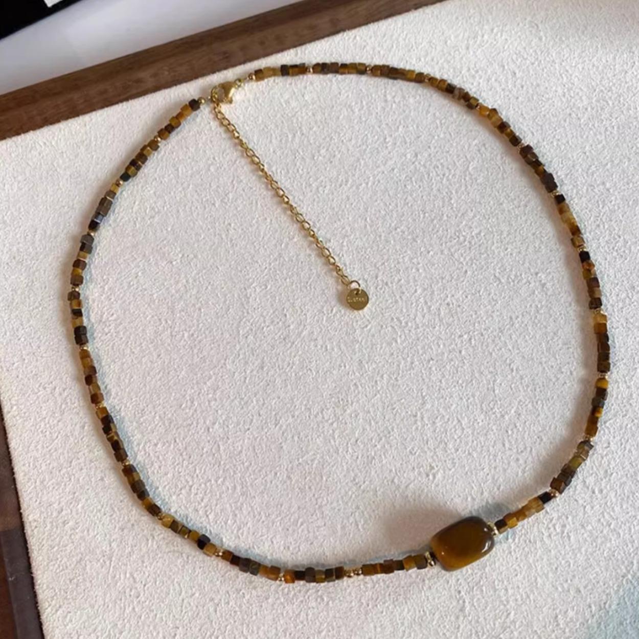 

Колье на ключицу Maillard Тигровый глаз и пресноводный жемчуг