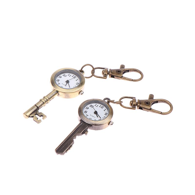 Niedliche schöne Taschenuhr im Markenstil mit Schlüsselanhänger und Kette aus Quarz