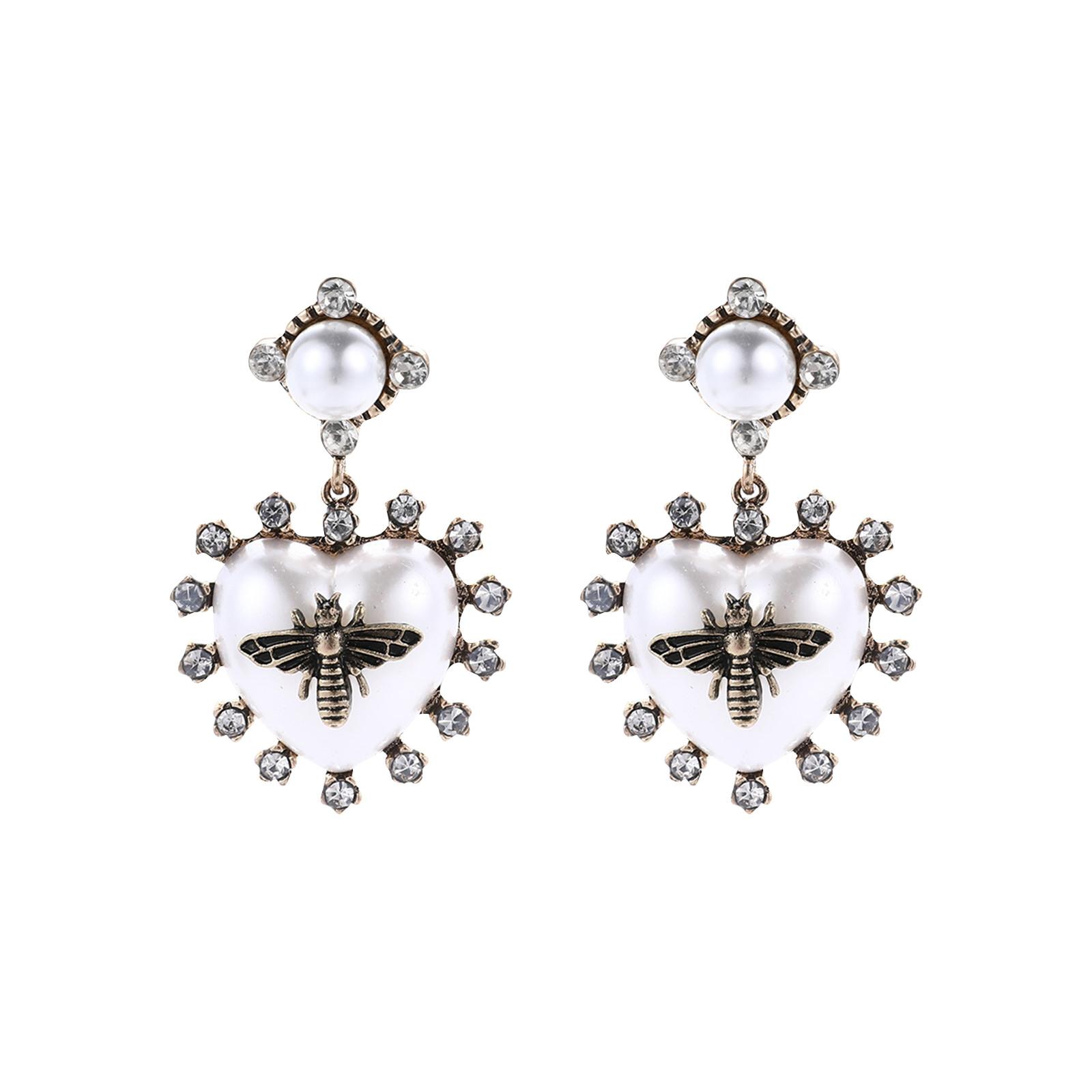 

Преувеличенные модные ретро-сплавные серьги с жемчугом и пчелой, с щедрым темпераментом и изысканной красотой One Size белый