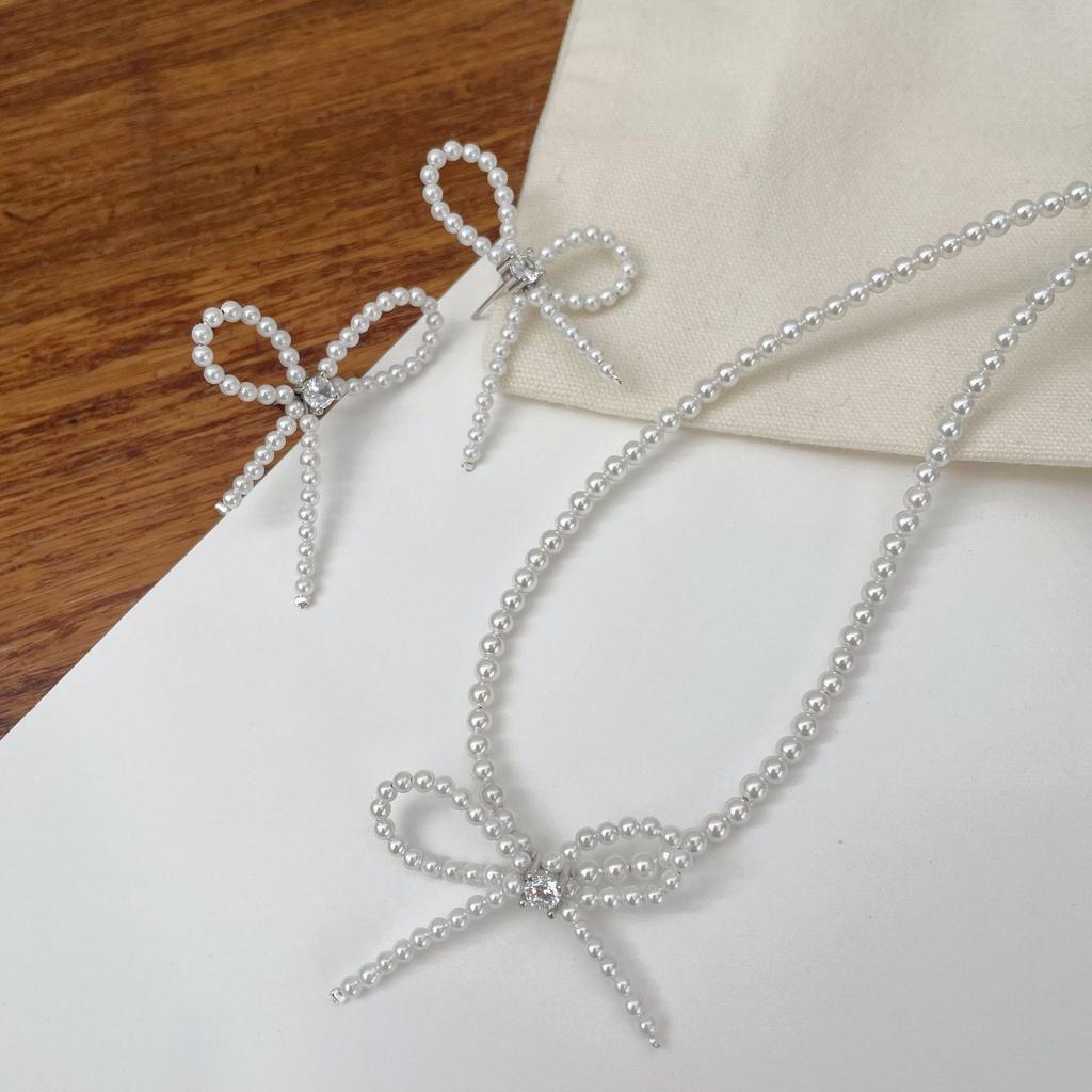 Simple and stylish S925 Temperament bow imitation pearl stud earrings women's zirconium necklace jewelry