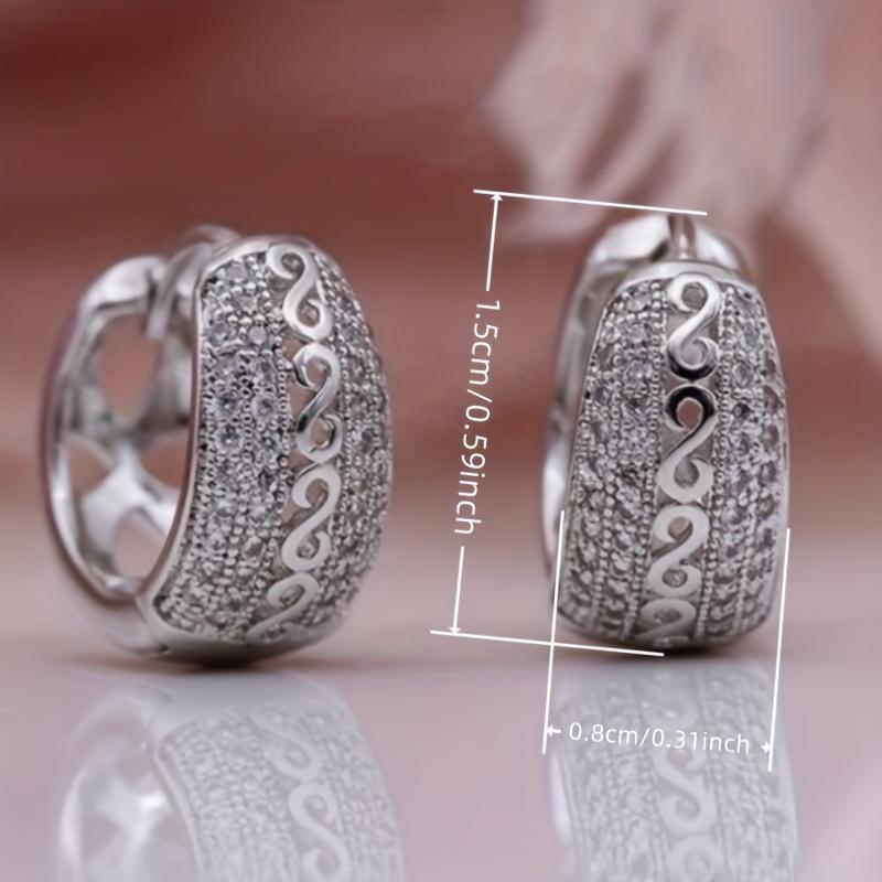 A Set of Stylish Earrings for Ladies Featuring an Endless Circular Design, Made with Synthetic Zirconia