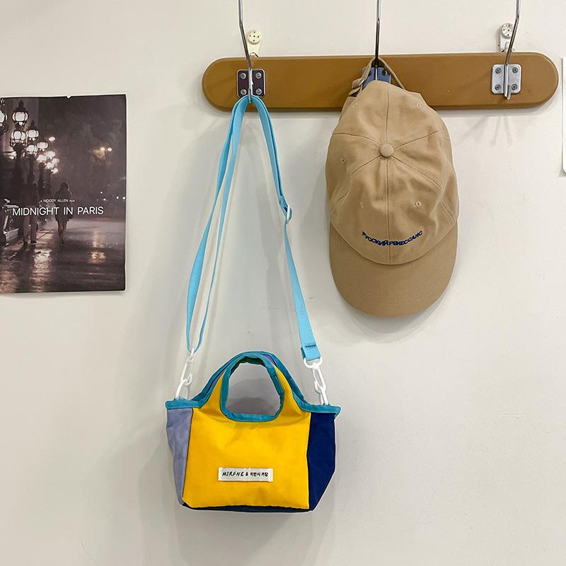 

2025 new mini messenger bag with the same color matching handbag niche design versatile vegetable basket dopamine women s bag 14*10*12 жёлтый