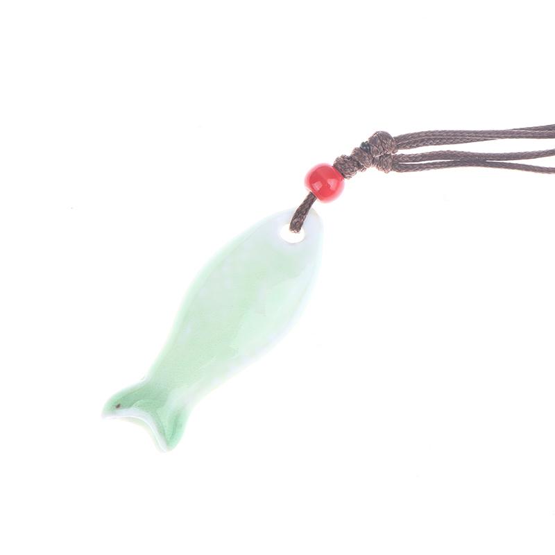 Collane Ciondolo Fischietto Pesce in Ceramica Stile Cinese Fischietto Fatto a Mano Liscio Collana con Fascino Delicato Catena per Maglione Unisex