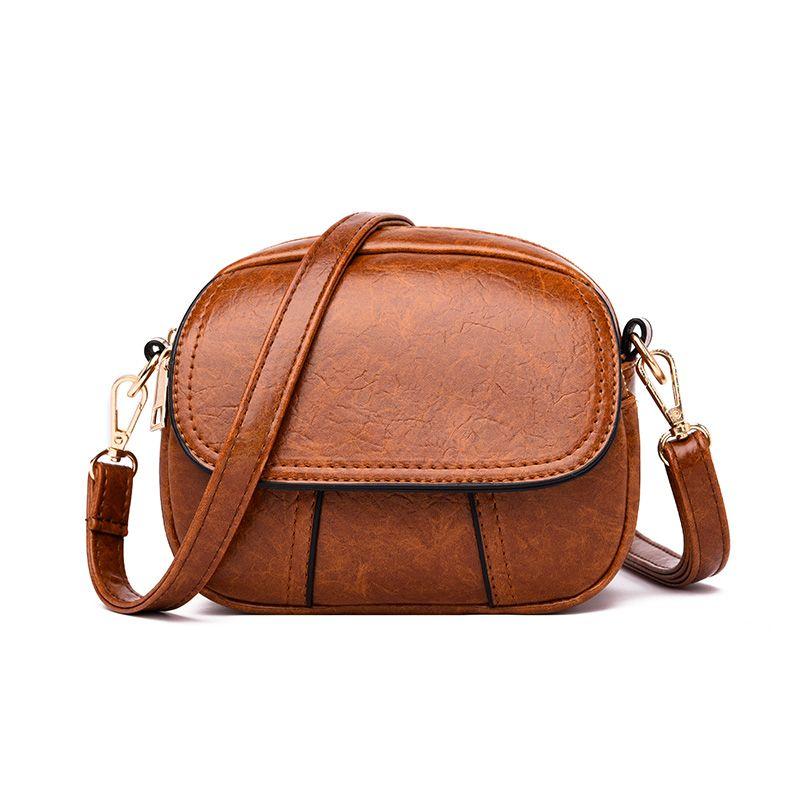 Mini Women's Bag 2025 New Fashion Retro Leather Texture Small Round Bag Shoulder Messenger Bag