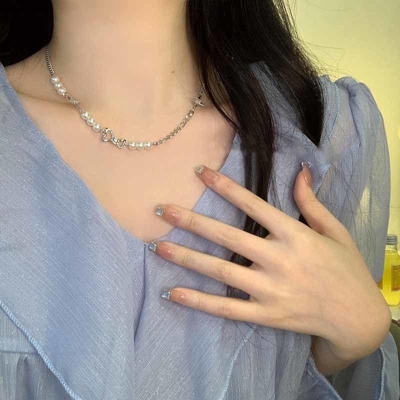 Imitation pearl splicing necklace women's temperament bow pendant light luxury niche design versatile collarbone chain