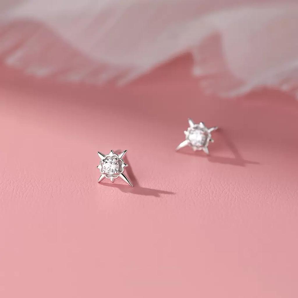 Beixi S999 Sterling Silver Star Earrings: Fashionable Eight-Pointed Studs with Black and White Cubic Zirconia
