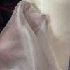 Pearl-like transparent lightweight smooth organza fabric suitable for wedding dresses formal gowns and designer clothing fabrics