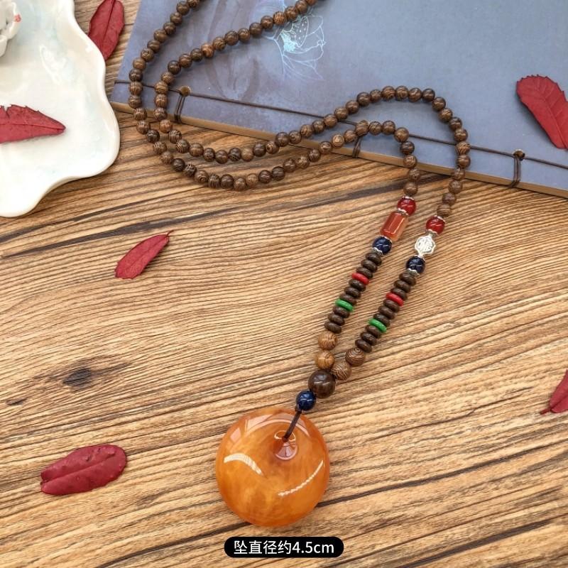 Retro chicken wing wood second generation old beeswax necklace men and women versatile amber pendant long sweater chain pendant