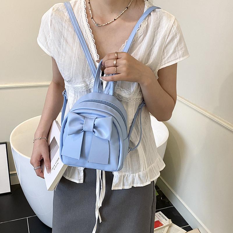 Süßer Mini-Rucksack mit Schmetterlings-Schleife aus PU-Material für den täglichen Gebrauch