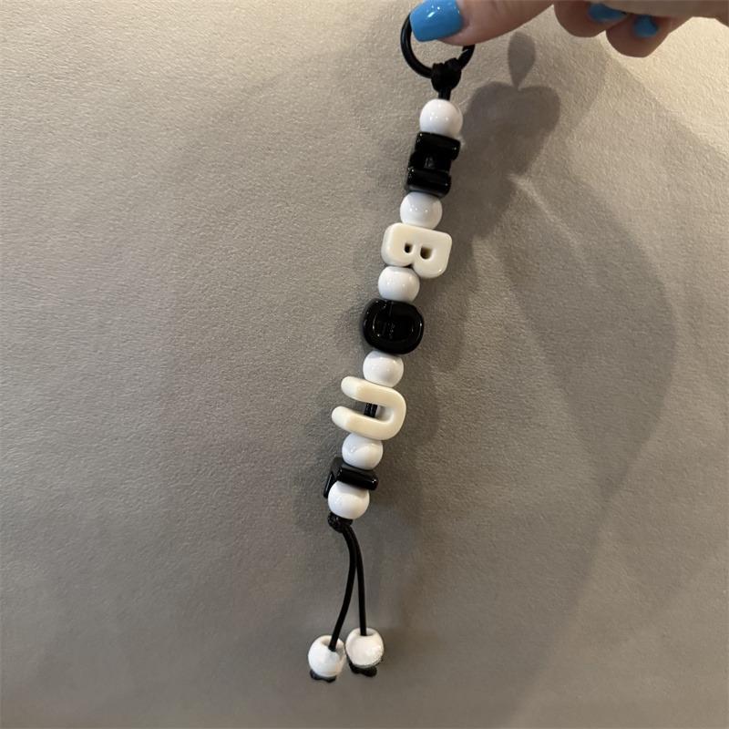 Customizable personality trend creative letter knot handwoven fashion nylon car keychain mobile phone cord