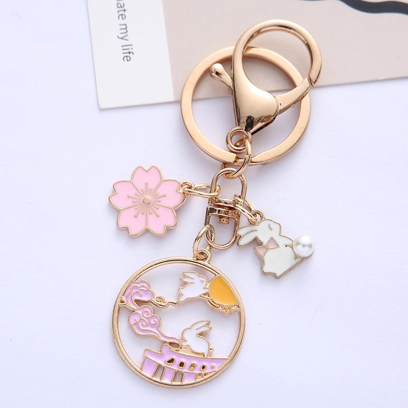 Cute Cartoon Rabbit Keychain Pendant with Floral Design