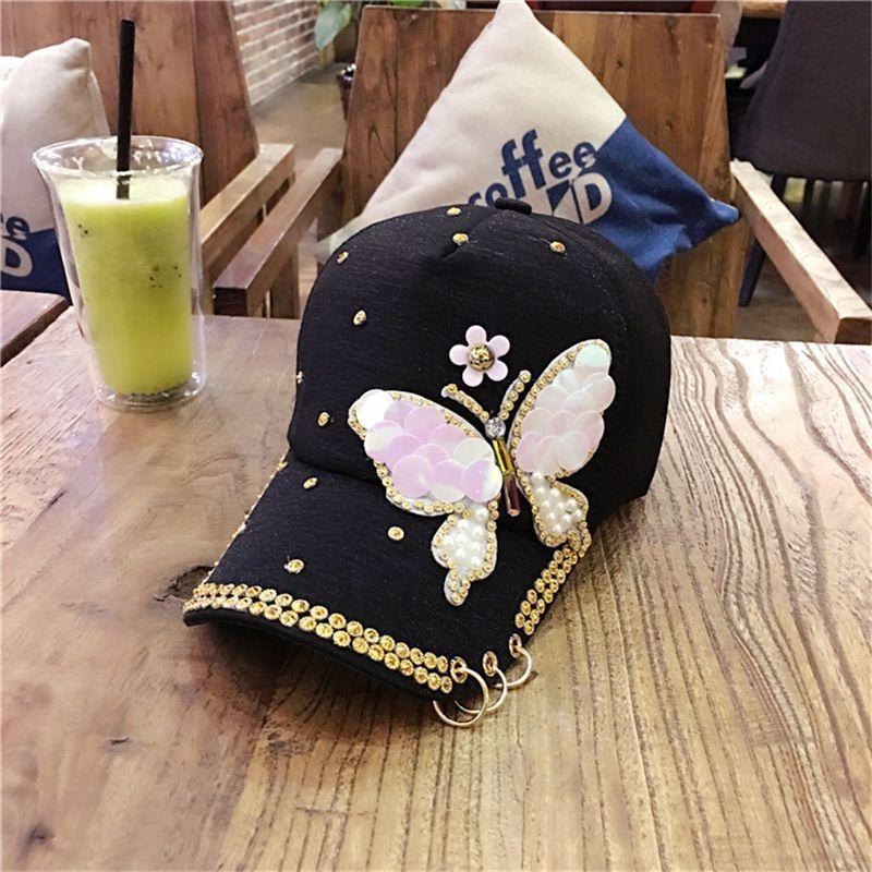 

Spring and summer Korean version butterfly studded diamond baseball cap outdoor women s sunshade metal three ring sun hat Adjustable чорний