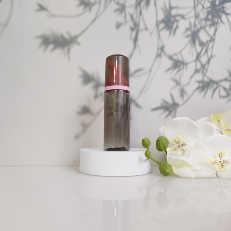 Available 60ml Transparent Black Foam Mousse Bottle for Face Wash and Travel-friendly Cosmetic Packaging.