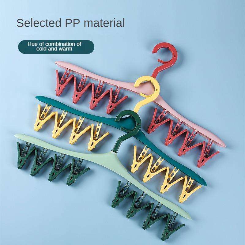 1 szt. Wielofunkcyjny wiatroszczelny wieszak do suszenia z 8 klipsami do ubrań, bielizny, skarpetek, cukierkowego koloru plastikowy wieszak na ubrania