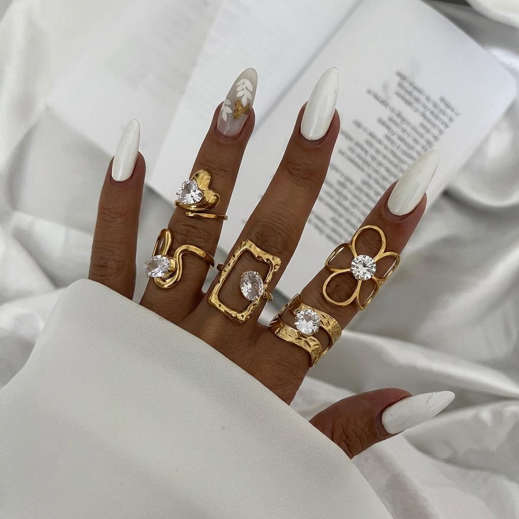 Xiyin stainless steel ring plated with 18k real gold, light luxury high-end titanium steel zirconium-inlaid irregular ring