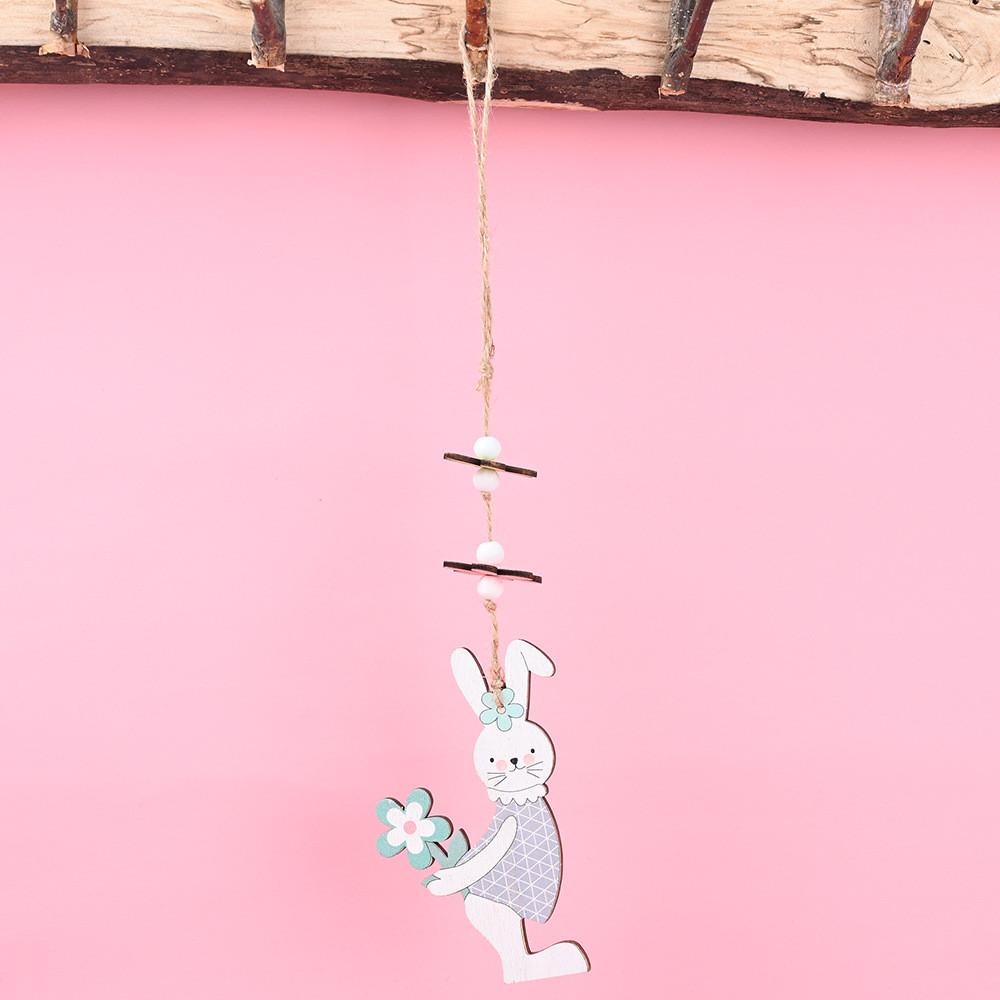 Entzückende Hängedekoration aus Holz mit langohrigem Häschen, perfekt für Osterfeiern