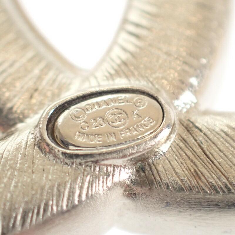 Chanel Brosche Gold/Schwarzmetall/Kristall Damen