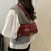Spice girl wind rivet armpit small bag women's new fashion niche design commuter bag patent leather shoulder bag bag