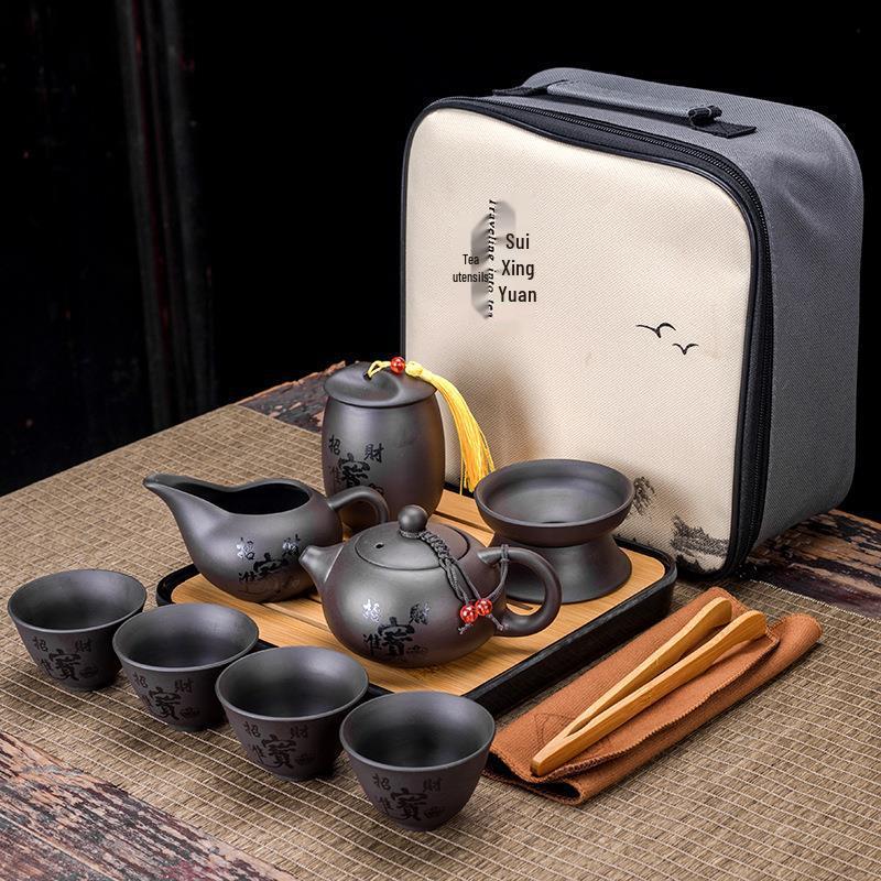 Creative Zisha Travel Kung Fu Tea Set: Portable Storage with One Pot and Four Cups - Ideal for Company Events and Gifts, Customizable with Logo.