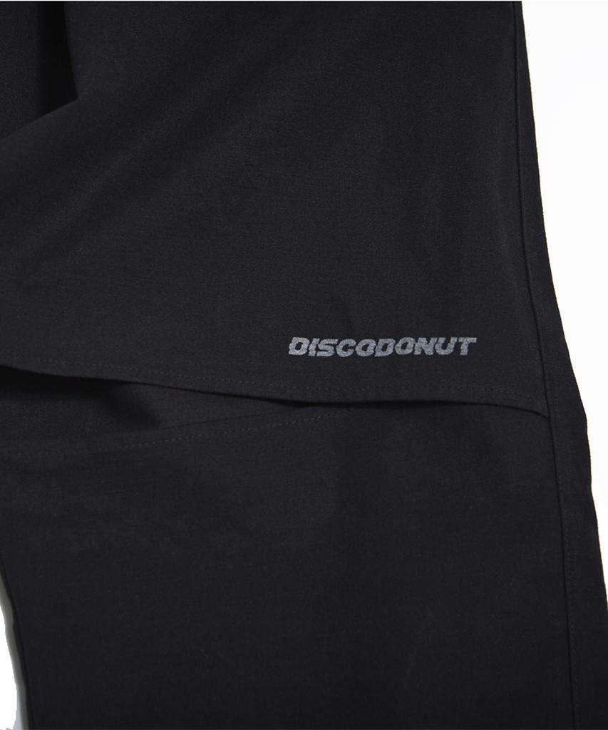 DISCO DONUT Elastic Waist Half-Cut Long Pants_Black