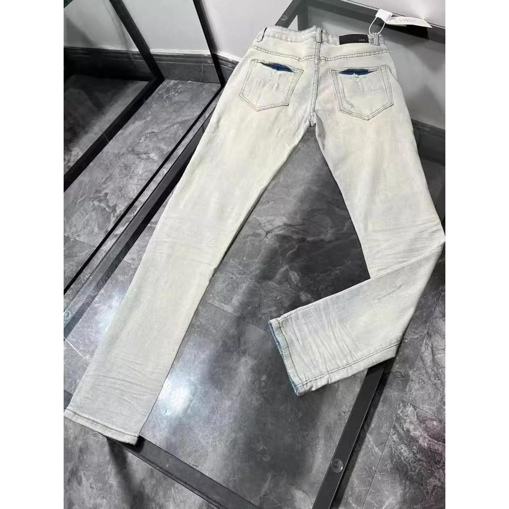 Spring American Ripped Design High-end Elastic Jeans Men's Slim Casual New Men's Pants Niche