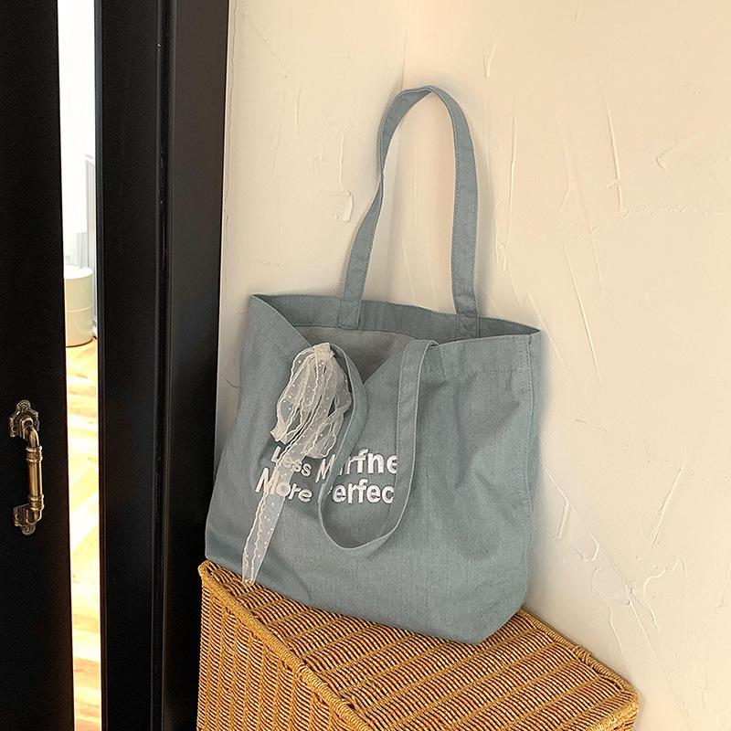 

2024 New Summer Casual Fashion Denim Bag Women s Simple Embroidery Large Capacity Underarm Bag Lightweight Handbag синій