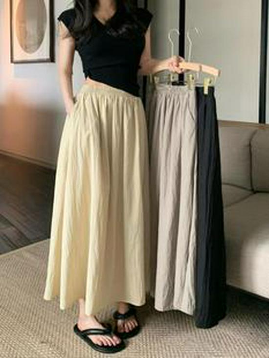Melaard Retro Brown High-Waisted Midi Skirt: Slimming Winter Style with Minimalist Draping.